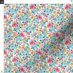 a floral pattern with pink, yellow and blue flowers