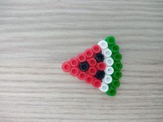 a piece of legos made to look like a slice of pizza