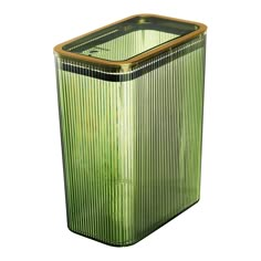 a green trash can sitting on top of a white floor