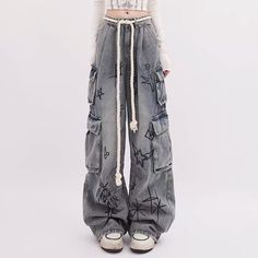 Grunge Denim Blue Pants For Streetwear, Baggy Grunge Jeans With Cargo Pockets, Vintage Wide Leg Cargo Jeans For Streetwear, Grunge Cargo Jeans For Spring Streetwear, Baggy High Rise Cargo Jeans Hip Hop Style, Vintage Style Loose Fit Cargo Jeans For Streetwear, Vintage Baggy Cargo Jeans For Streetwear, Baggy Vintage Cargo Jeans For Streetwear, Baggy Grunge Cargo Jeans