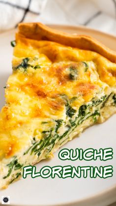 a slice of quiche florentine on a plate