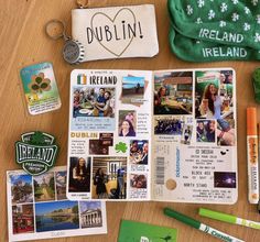 the contents of a travel kit laid out on a table with pens, markers and magnets