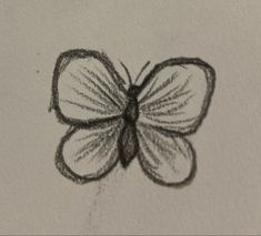 a black and white drawing of a butterfly