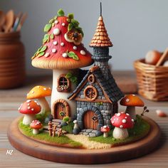 a small toy house with mushrooms around it