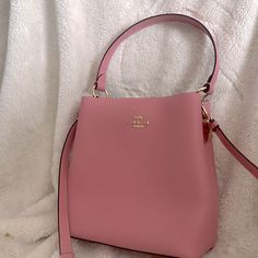 Just Sat In My Closet For A Year Or Two. Great Condition, Plastic Still On Zipper, And Never Used! Tags And All Packaging Have Been Thrown Out. Designer Pink Satchel Bucket Bag, Luxury Pink Shoulder Bucket Bag, Luxury Pink Double Handle Bucket Bag, Classic Pink Bag With Dust Bag Included, Luxury Pink Bucket Bag With Adjustable Strap, Elegant Bucket Satchel With Detachable Handle, Luxury Pink Bucket Bag For Everyday, Pink Satchel For Everyday, Pink Satchel Bucket Bag With Detachable Strap