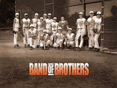 a group of baseball players standing next to each other