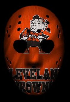 the cleveland browns logo on an orange hockey mask