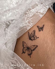 78 Minimalist Tattoos That Will Inspire You To Get Inked Minimalist Butterfly Tattoo Design, Butterfly’s Flying Tattoo, Butterfly Ocean Tattoo, Side Of Butterfly Tattoo, Butterfly Tattoos Fine Line, Fine Line Butterfly Tattoo Forearm, Butterfly Filler Tattoo, Landing Butterfly Tattoo, Butterfly Tattoo Side Ribs