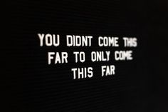 the words you didn't come this far to only come this far are projected on a wall