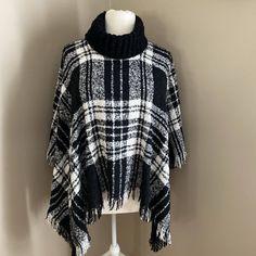 Make A Statement With This Steve Madden Poncho Sweater In Black And White Buffalo Plaid. The Cowl Neck And Slit Sleeves Add A Touch Of Bohemian Style, While The Cable-Knit Pattern And Lightweight Fabric Make It Perfect For Fall And Winter. This One Size Fits All Pullon Poncho Is Machine Washable And Made Of Polyester Flannel. It Features A Relaxed Fit Perfect For Casual Occasions And Parties, And Its Colorful And Classic Design Will Surely Draw Attention. Ideal For Any Beauty And The Beast Fan W Cowl Neck Poncho, Poncho Sweater, White Buffalo, Shrug Sweater, Knit Pattern, Black Cats, White Plaid, Buffalo Plaid, The Beast