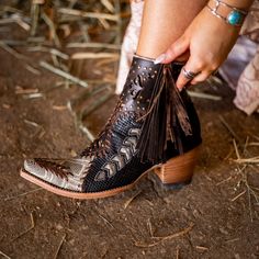 Introducing KALIOPE - WOMEN'S, the perfect combination of style and function. This boot features laser cut outs, python print, and fringe detailing, as well as braiding and gold studs for added flair. Make a statement and stand out from the crowd with these neat and eye-catching boots. Bailey Core, Wedding Cowboy Boots, Boho Shoes, Witch Fashion, Python Print, Baby Cowboy, Cowgirl Style, Winter Shoes, Western Outfits