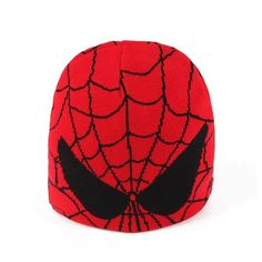 a red spiderman hat with black eyes on the front and bottom, sitting against a white background