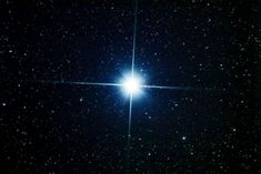 the bright star is shining brightly in the dark sky