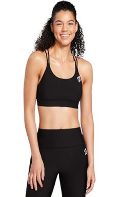 PRICES MAY VARY. Style with Comfort: Peloton Cadent Elevate Padded Sports Bra is a low-medium impact bra with back strappy details & removable cup pads. This sports bra for women looks chic & flattering while providing freedom of movement during activities Breathable Fabric: With a double-knit, breathable, and moisture-wicking fabric, this workout bra is designed for ease of motion. Our moderate compression supportive bras for women are durable enough for tread, row, strength, yoga & everyday wear Superior Fit: Our 71% Polyester & 29% Spandex gym bra offers a tight & snug fit (fits close to the body). This womens activewear performance bra prevents rolling or bunching up of fabric during activities, providing maximum comfort while you work out Daily Wear Women's Sports Bra: This medium com Supportive Bras, Women Looks, Strength Yoga, Workout Bra, Compression Bra, Gym Bra, Daily Workouts, Activewear For Women, Bra For Women