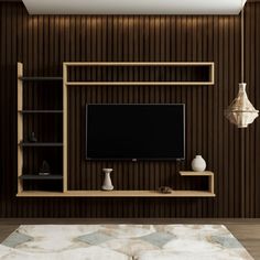 a modern living room with wood paneled walls and shelves on either side of the tv