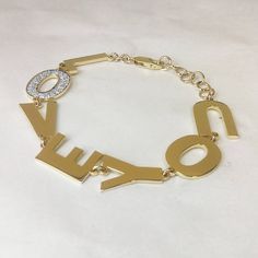 Our Cutoff Date for Christmas delivery is Sunday Dec. 13, 2020 All Order placed after this date will be completed for mid January delivery. women love you bracelet in 14kt. Gold and Diamond Initial - The most unique and treasured jewelry you can find. Perfect gift for you and your special one. Features: ~Hand Made 14k Yellow Gold (Available also in 14k white gold and 14k Rose gold) ~Bracelet is available length is (6 Inch) (7 Inch) (8 Inch) and (9 inch) ~Diamond (O) of the word Love ~Total Diamo F Is Fendi Gold Bracelet, Elegant Gold Bracelets For Anniversary Gift, Solid Silver Bracelets, 14k Rose Gold Bracelet, Bracelet Love, Gold Armband, Letter Bracelet, Photo Charms, Love Bracelet