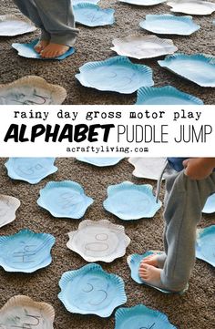 a child's feet on the ground in front of paper plates with letters and numbers