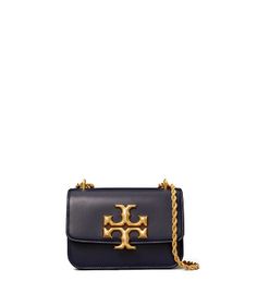 Directly from Tory Burch - Signature hardware, scaled-up in sculptural brass. From our Fall/Winter 2020 runway, the new Eleanor Small Bag is a structured shape in soft Italian leather - with edges that are painted by hand, to emphasize the clean lines. Its twisted rope chain is inspired by jewelry, and is convertible: wear it doubled or long and crossbody. Tory Burch Official Site. Designer Tan Flap Bag For Travel, Elegant Shoulder Bag With Logo, Elegant Logo Shoulder Bag, Formal Top Handle Bag With Logo, Evening Rectangular Bag With Logo, Rectangular Evening Bag With Logo, Elegant Crossbody Bag With Logo, Formal Satchel Bag With Logo, Elegant Formal Satchel With Logo