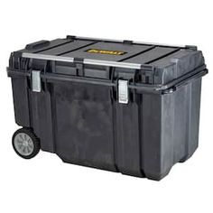 a large black plastic box with wheels on a white backgrounge background, it is also used for storage