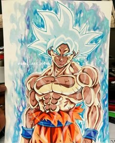 a drawing of gohan from dragon ball is displayed in front of a person's hand