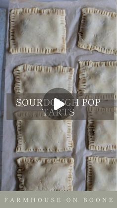 some food that is sitting on top of a sheet of wax paper with the words sourdough pop tarts