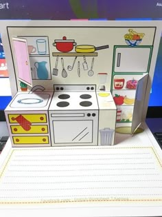 a paper model of a kitchen with appliances