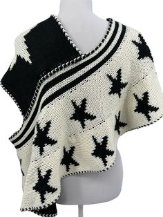 Elan 1 Shoulder Reversible Off White & Black Star Patterned Knit Poncho Shrug Womens One Size. 100% acrylic. Style SWP60 In excellent condition - a few loose threads - please see all photos and description In most cases, the item I am selling is preowned and may or may not have been laundered prior to shipment.  I do my best to describe any flaws or imperfections, so please read all details I provide. If you have a special request such as expedited or combined shipping, please communicate with m Shoulder Off, Knit Poncho, Cute Stars, Crochet Poncho, Knitted Poncho, Black Star, Star Patterns, Sweater Outfits, Knitting Patterns