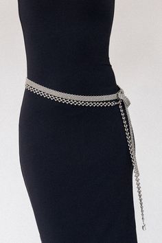 Imagine a celestial ballet – planets swirling, stars twinkling. The Nova Silver Chain Belt captures that ethereal beauty with interconnected circular links adorned with shimmering spheres. Crafted from high-quality recycled stainless steel, this exquisite belt boasts a sleek, polished finish that radiates cosmic allure. Style It Your Way: Wear it as a statement waist cincher or elevate your look by styling it as a striking necklace. The Nova effortlessly transitions from day to night, adding a t Silver Belt Chain, Waist Chain Outfit, Silver Waist Chain, Chain Outfit, Silver Chain Belt, Silver Gold Necklace, Hair Charms, Belt Chain, Planets And Stars