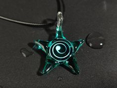 Perfect for everyday wear, this stylish starfish pendant is designed for those looking for a unique necklace. It makes a thoughtful gift for your wife, girlfriend or friend. Whether it's a birthday, anniversary or any other occasion, this pendant will perfectly convey your love. ✨ Perfect Gift Size: 3.54 inches long, 2.36 inches wide; Material: Glass; Lightweight: This pendant weighs only 25 grams, ensuring it is comfortable to wear for any occasion, from casual outings to special events. Note: As this is a handmade pendant, slight differences may occur, but each piece is unique. Please keep it away from water and chemicals to preserve its vibrant color and shine. 📦 Shipping and Handling All orders will be processed and shipped within 2-5 business days. Each item is carefully packaged to Spiral Star, Fantasy Ocean, Necklace Rope, Starfish Pendant, Glass Pendant Necklace, Unique Necklace, Rope Necklace, Glass Necklace, Star Necklace