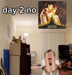 a boy is screaming in front of a movie poster with the words day 2 no