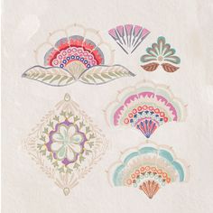 four different colored designs on white paper