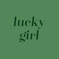 the words lucky girl are in black on a green background