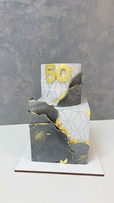 a piece of cake that has been made to look like the number 50 on it