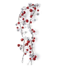 a red and white garland with silver balls