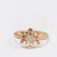 Fairy tale like Snowflake ring. Wax carved then cast in Solid Gold Shown here in 14K Yellow Gold and set with Diamonds. These VS Quality Diamonds sparkle intensely and gleam on your finger. The beauty of this ring is in the Symmetry and delicate hand workings around each stone. The contrast between the Gold and the Diamonds is remarkable is allows the stones to light up. This ring could stack wonderfully with your other Ardonn Rings or other rings here from different sellers here on etsy!. ► Han Snowflake Ring, Black Diamond Earrings, Unique Diamond Engagement Rings, Diamonds Jewelry, Gold Snowflake, Snowflake Design, Unique Engagement Ring, Etsy Gold Ring, Wedding Ring Designs