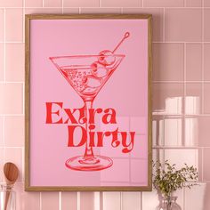 a pink poster with the words extra dirty on it in front of a kitchen counter