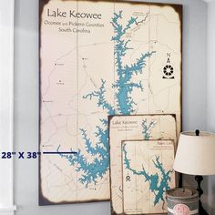 the lake keowee map is displayed next to a lamp