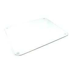 a glass cutting board sitting on top of a white table