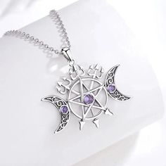 Connect with divine energy and bring your magic to life with this stunning Triple Moon Pentagram Necklace. Crafted with hypoallergenic sterling silver that's free of nickel, lead, and cadmium, this Wicca Pagan Jewelry is made to last—letting you enjoy its beauty for years! Have confidence in its high-quality and show up to the world, looking simply magical ☪️ Pendant Size: 35.6*26.6mm；Weight:6.5g; Chain size: 18 inch ( 46cm) ,Chain width 1.1 mm Package: Package Included (To Choose one of 3 Diffe Triple Moon Pentagram, Magical Pendant, Pentacle Jewelry, Pentagram Jewelry, Moon Pentagram, Pentacle Necklace, Moon Pentacle, Moon Goddess Necklace, Pagan Necklace