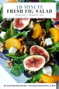 fresh fig salad with oranges, walnuts and spinach on a white plate