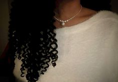 pearl necklace, long black curly hair, classy fashion, modest fashion, white fluffy sweater, luxury fashion Curly Hair Classy, White Fluffy Sweater, Long Black Curly Hair, Pearl Necklace Long, Black Curly, Fluffy Sweater, Black Curly Hair, Fashion White