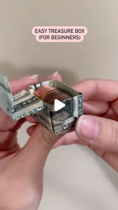 two hands holding money with the words easy treasure box for beginners