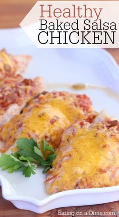 healthy baked salsa chicken on a white plate