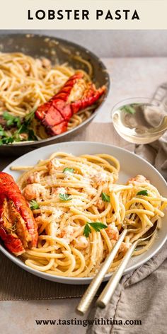 lobster lobster pasta in a white bowl with chopsticks on the side