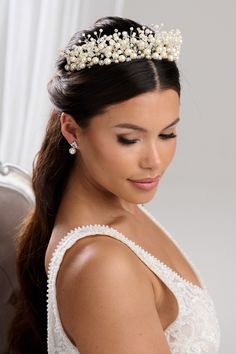 For a bridal tiara that doesn't feel too traditional or too trendy, look for a classic style with a modern twist. This large tiara by Arianna features sprigs of pearl, crystal and diamante. The perfect bridal headpiece to make a style statement on your wedding day! Wear with a beautiful bridal updo for a classic feel or loose waves for a more romantic look. #weddinghairaccessories #bridalhairaccessories Bridal Hair Jewellery, Beautiful Wedding Hair, Wedding Tiaras, Hair Accessories Bridal, Pearl Tiara, Hair Jewellery