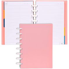 two pink notebooks with spiral bound pages on each side and lined paper in the middle