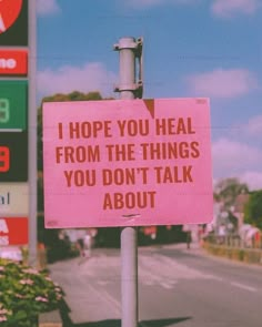 a pink sign that says i hope you heal from the things you don't talk about