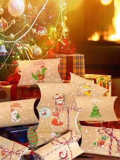 several wrapped presents under a decorated christmas tree