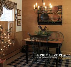 a table and chairs in a room decorated for christmas