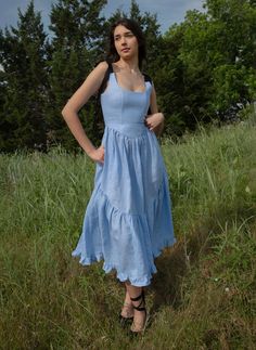 A truly special dress. With rich black ribbon tie straps, a corset bodice, and sweeping ruffle hem the Mirabelle Dress is dramatic, romantic beauty at its best and one of our most popular styles. Made in a lightweight blue gingham linen with a sateen finish that gives the linen a subtle dressy luster. A showstopper of a dress made for special moments, celebrations, or romantic getaways. Fairy Wardrobe, Wonderland Aesthetic, Alice In Wonderland Aesthetic, Fantasy High, Gingham Linen